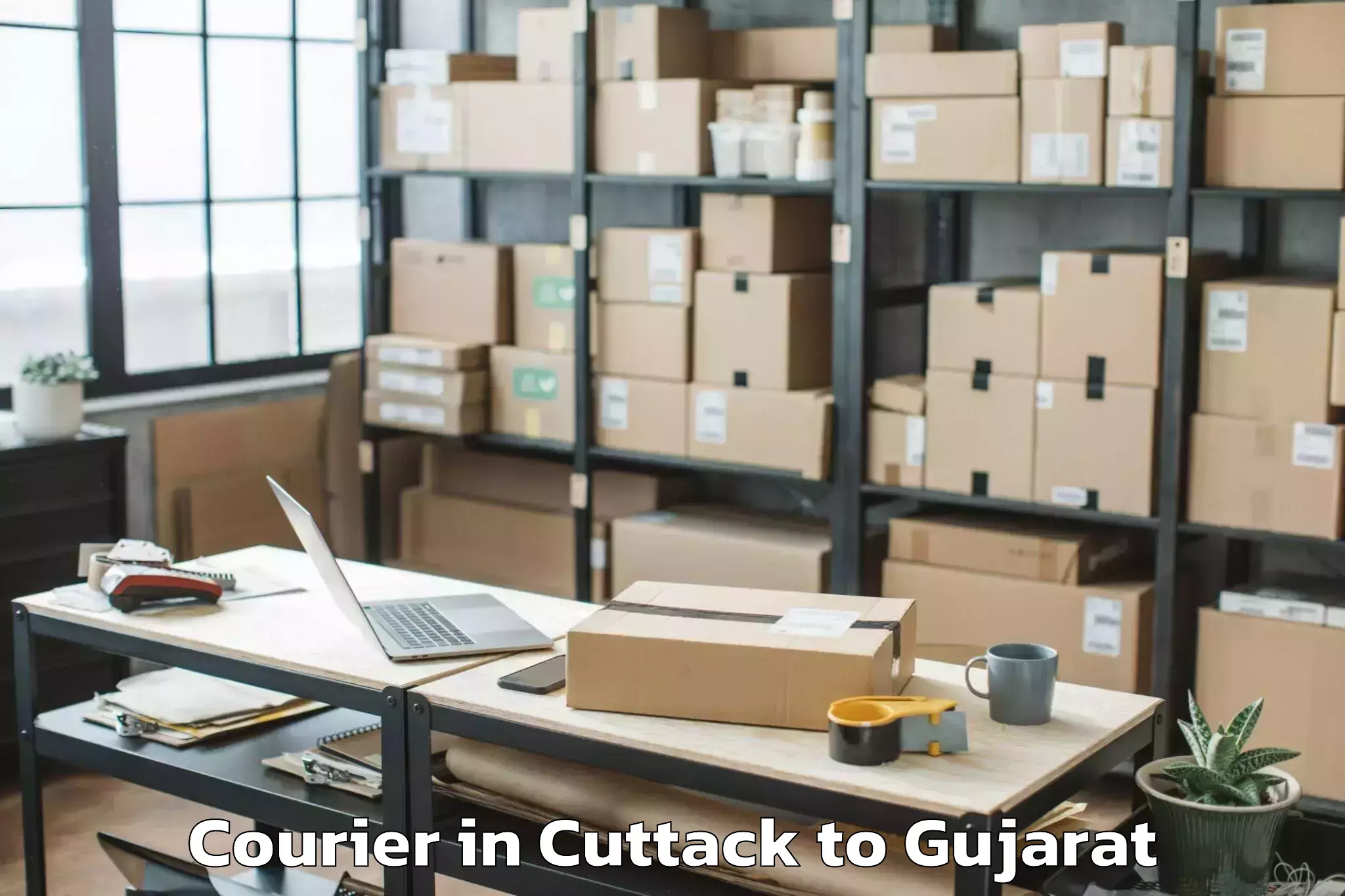 Book Cuttack to Songadh Courier